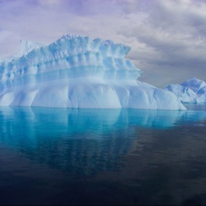 Iceberg and Zodiak in Antactica